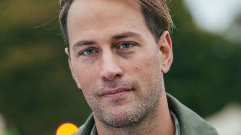 Tristramas Stuartas šypsosi